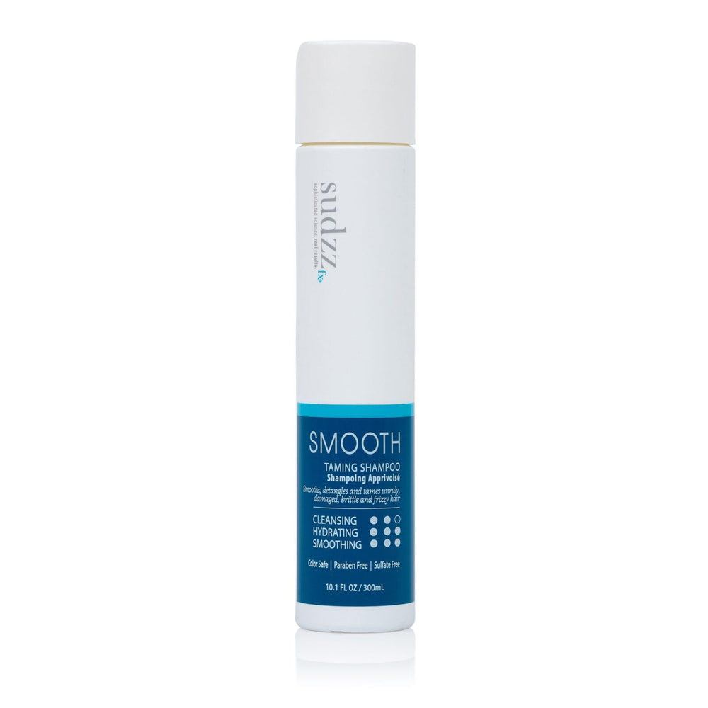 SUDZZFX Smooth Taming Shampoo bottle pour showing easy frizz control and hydration