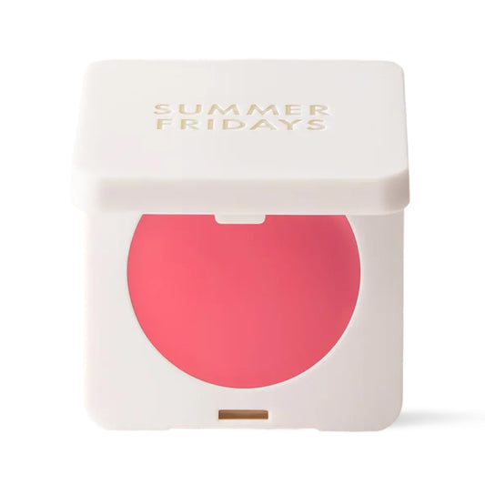 Summer Fridays Blush Butter Balm Pink Sunset tube close-up showing travel-ready color.