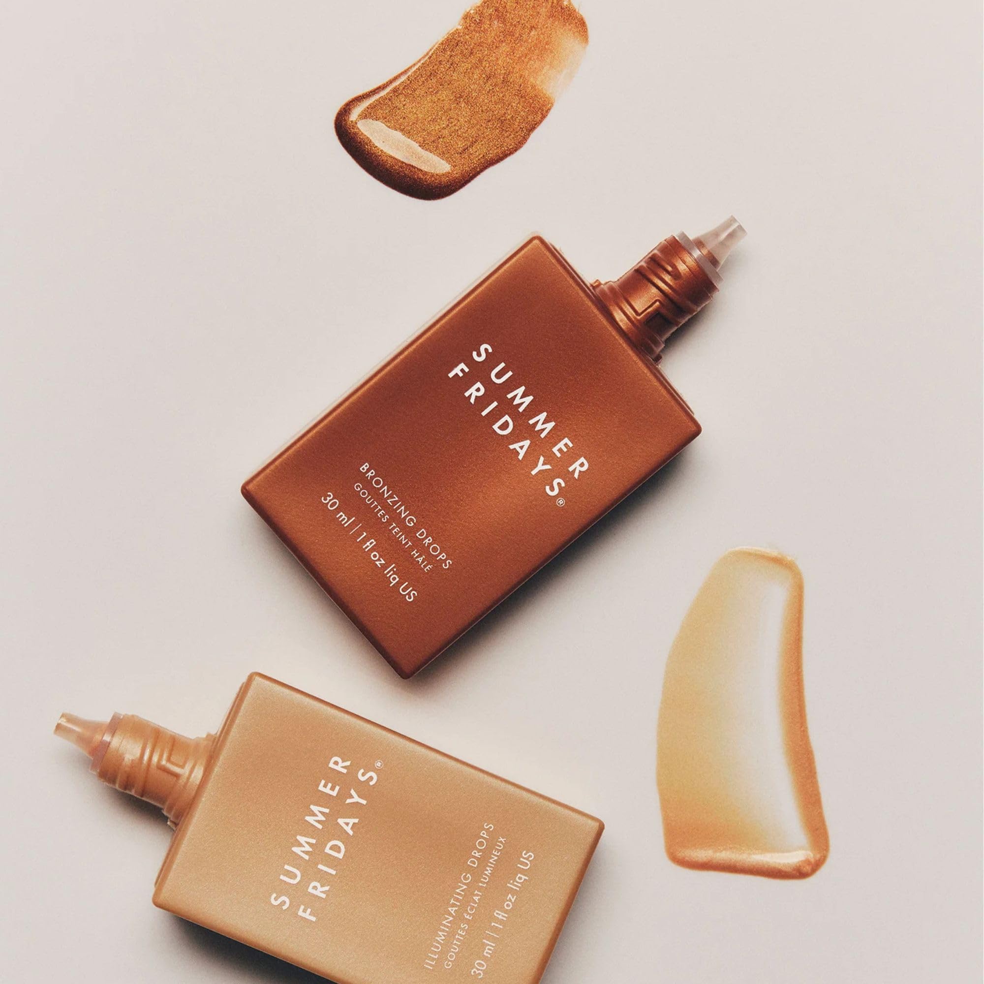 Summer Fridays Bronzing Drops arm swatch showing blended warmth.