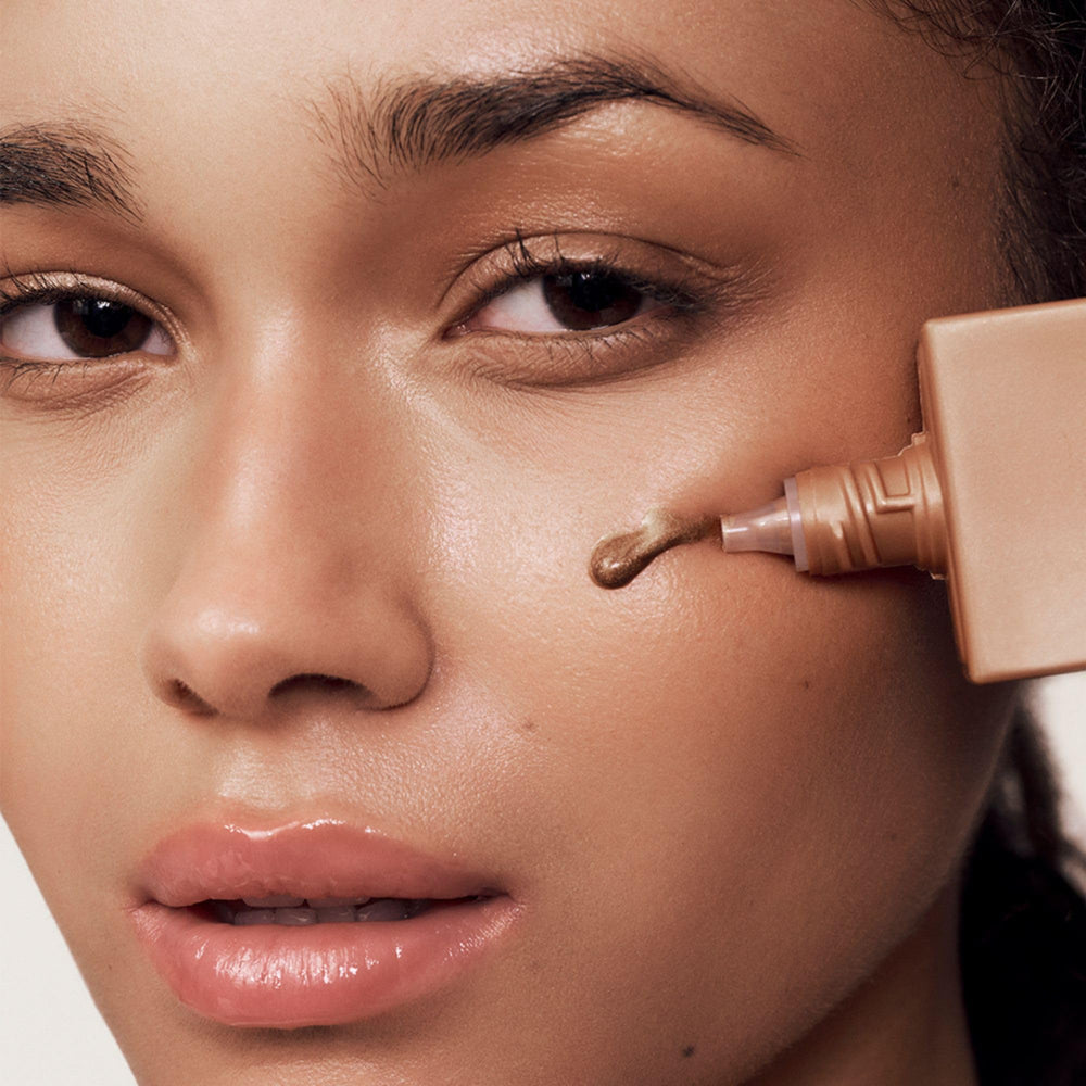 Summer Fridays Bronzing Drops mixed with moisturizer to boost radiance.