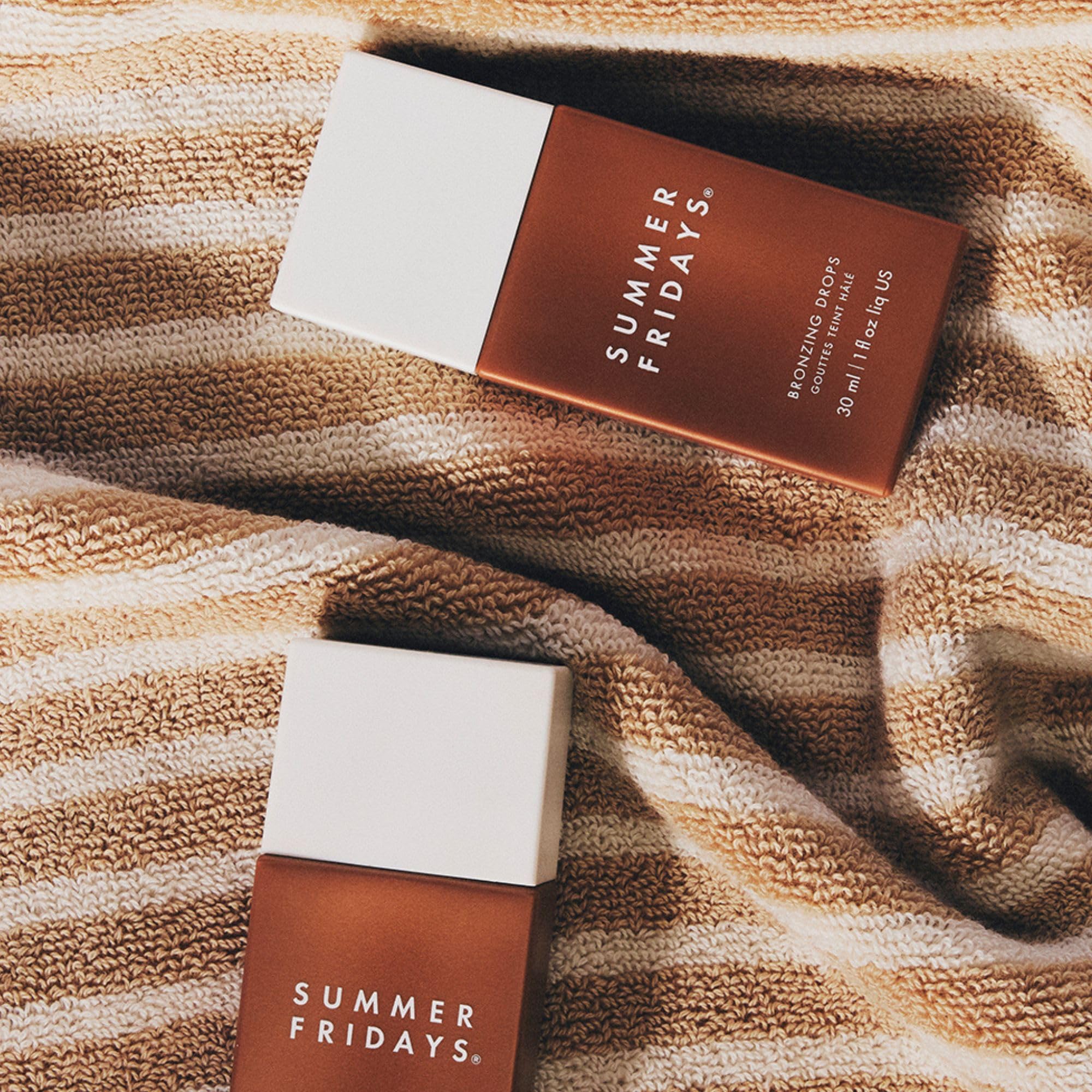 Summer Fridays Bronzing Drops packaging to highlight brand design.