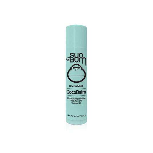 Sun Bum CocoBalm Pinacolada tube close-up highlighting tropical lip nourishment.