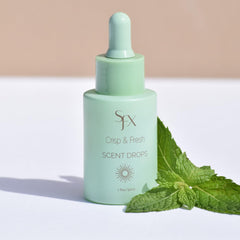 SunFX Scent Drops added to tanning solution for enhanced aroma during spray tan.