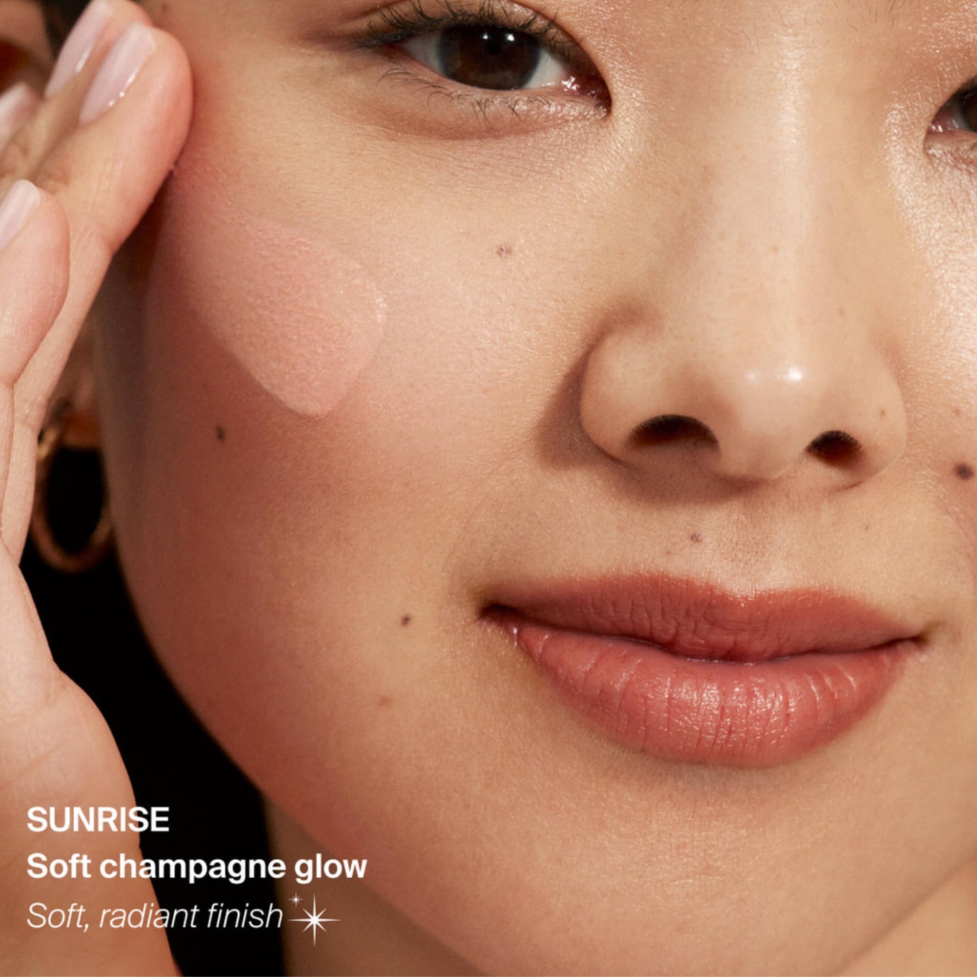 Supergoop Glowscreen Drops Sunrise pumped onto fingertips for quick, streak-free coverage