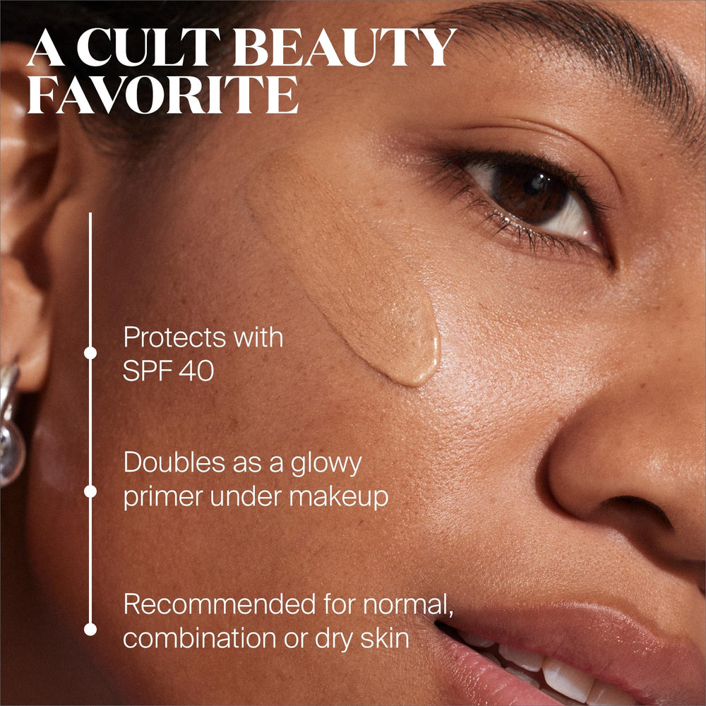 Arm swatch highlights dewy finish and bronze tint for radiant complexion