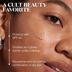 Arm swatch highlights dewy finish and bronze tint for radiant complexion