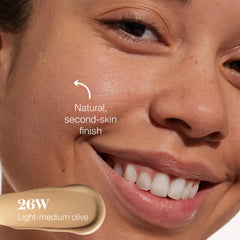 Packaging close-up highlighting cushiony formula and lightweight wear.