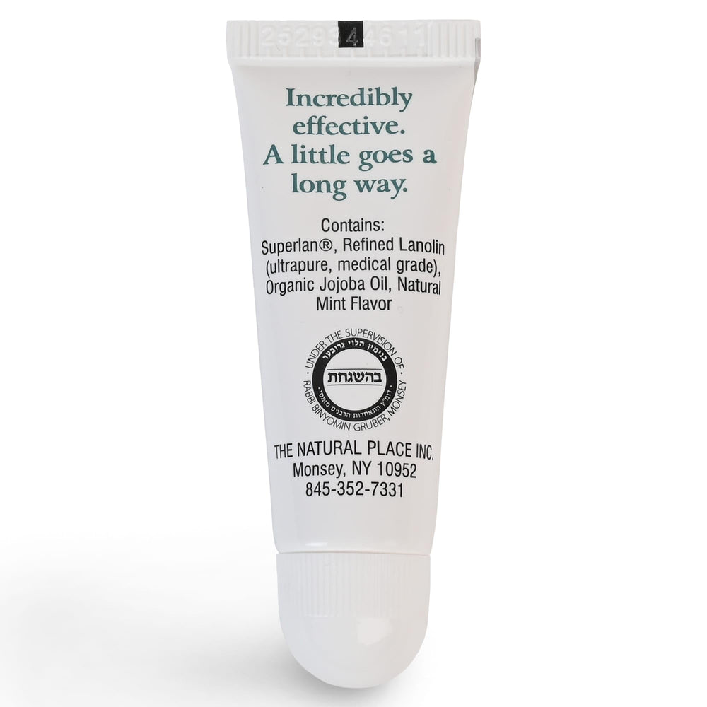 Superlan Mint-flavored lip balm on lips for refreshing feel.
