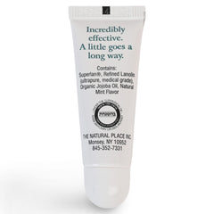 Superlan Mint-flavored lip balm on lips for refreshing feel.