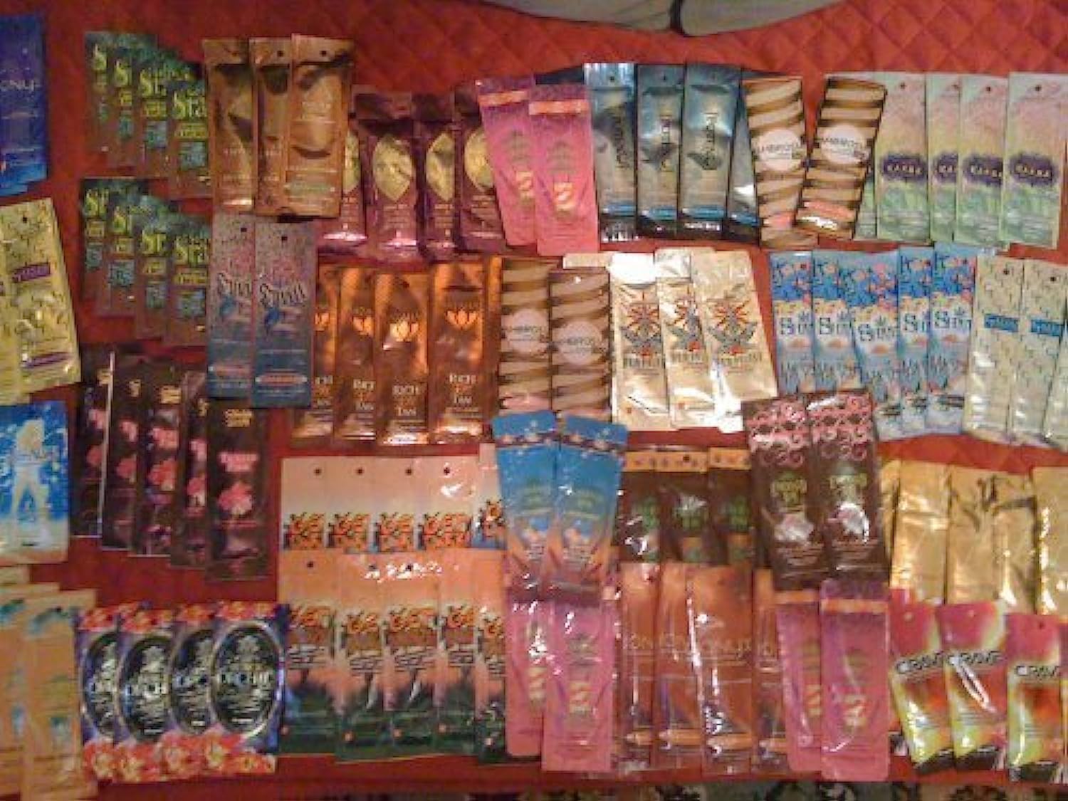 Supre indoor tanning lotion packets, assorted samples for easy trial and scent comparison.