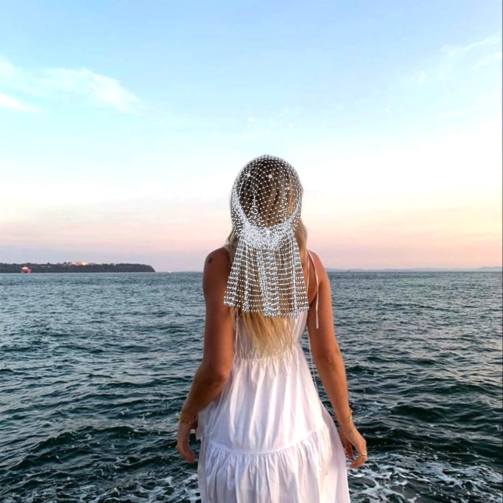 Surblue nightclub headpiece enhances evening outfits with shimmering focal point.