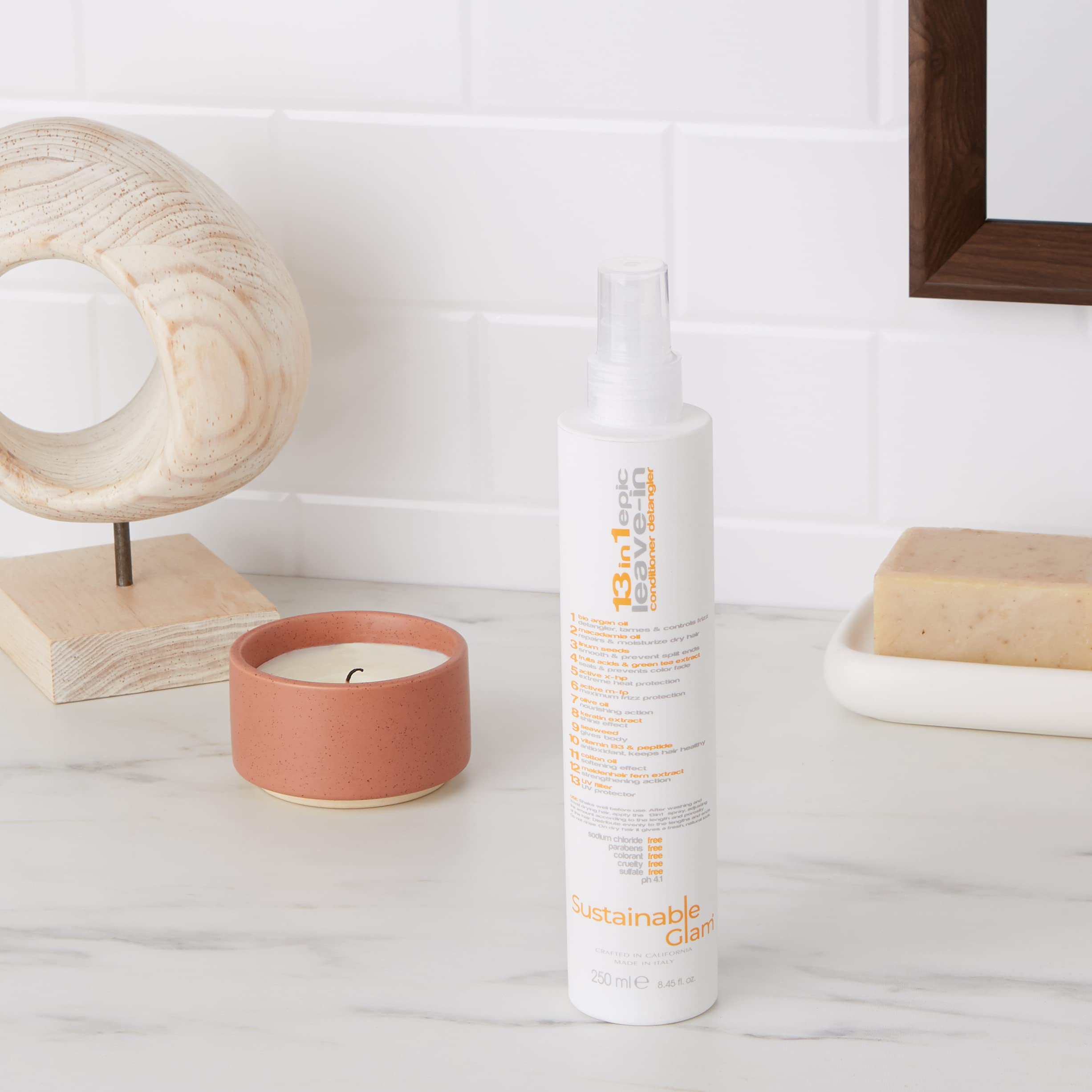 Sustainable Glam Epic Leave-In Spray Mist shows even distribution for easy detangling.