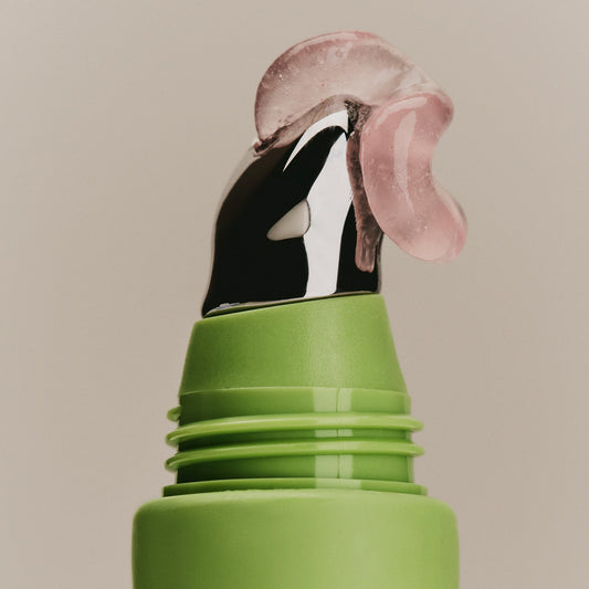 SWEET JULY SKIN Lip Treatment bottle open showing smooth lip application