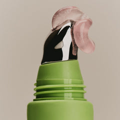 SWEET JULY SKIN Lip Treatment bottle open showing smooth lip application