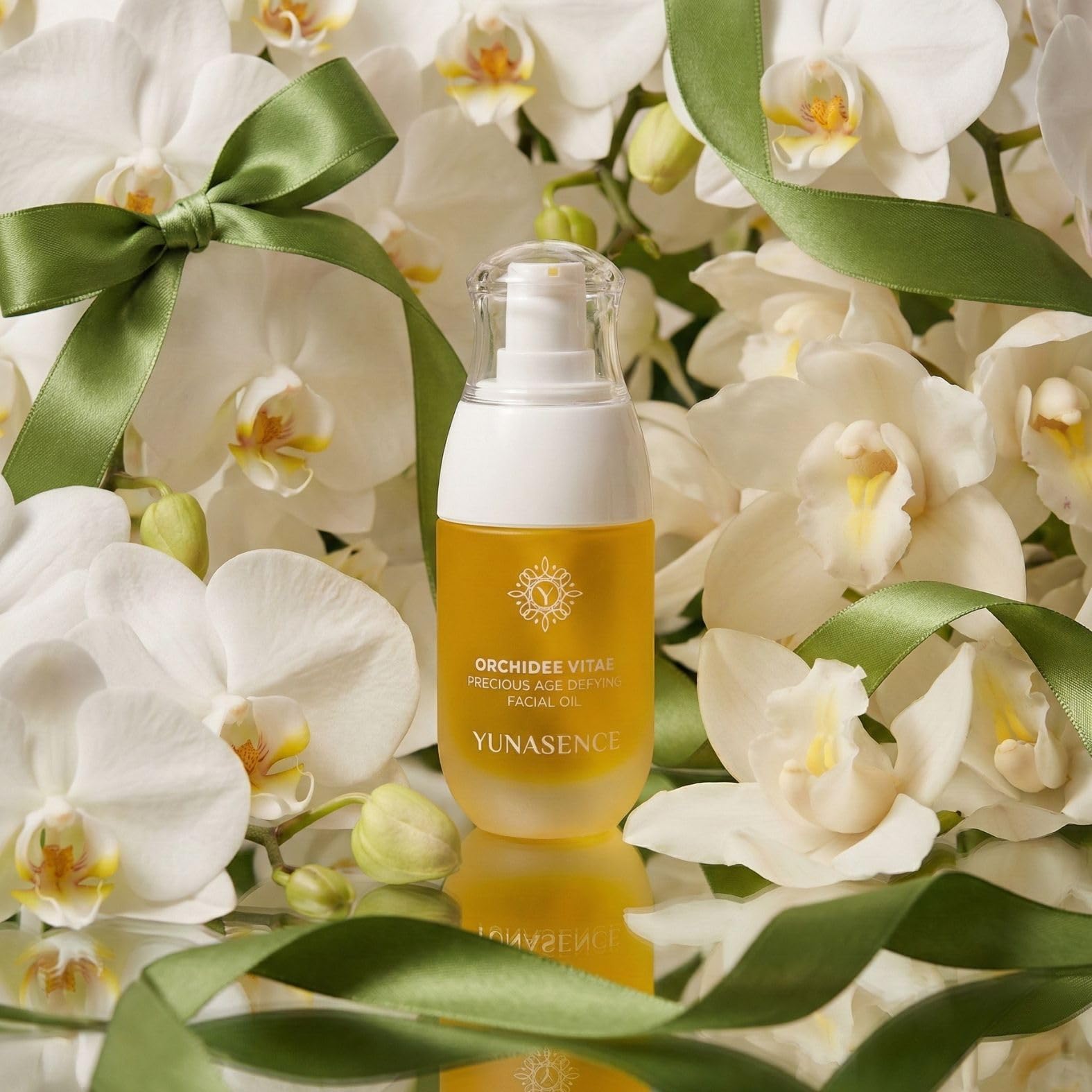 Silky serum texture on skin suggesting a radiant, smooth finish.