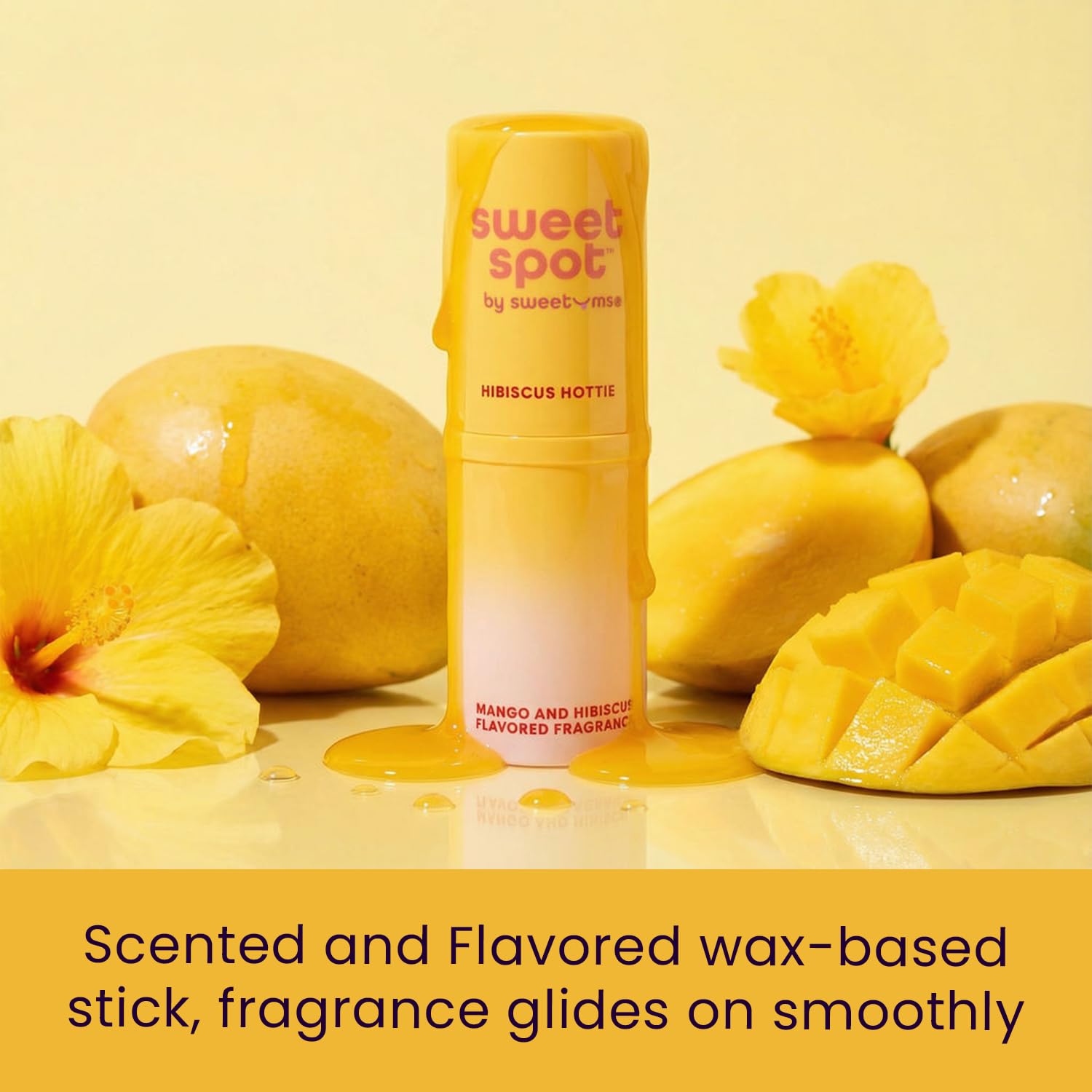 Sweetums SweetSpot Mango Hibiscus stick applying fragrance on skin.