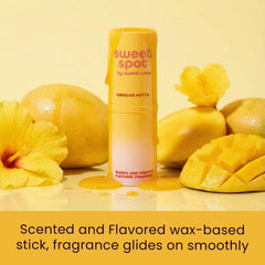 Sweetums SweetSpot Mango Hibiscus stick applying fragrance on skin.