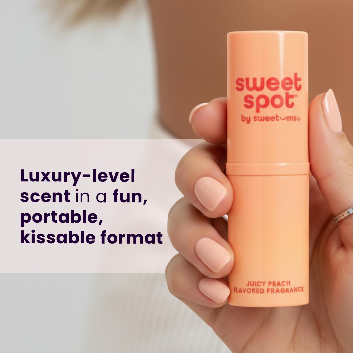 Sweetums SweetSpot Peach on lips illustrates flavor-infused fragrance concept