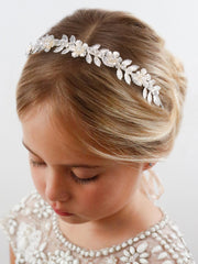 Closeup of ivory pearl detail on SWEETV flower girl headpiece.