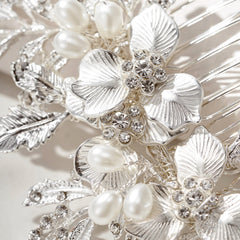 SweetV pearl and rhinestone flower design enhances wedding day silhouette.