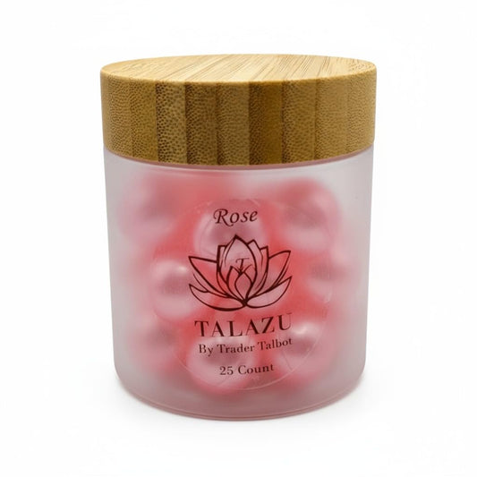 Talazu Rose beads being poured into a warm bath for a relaxing aroma.