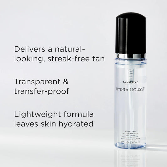 Tan-Luxe Hydra Mousse applied with mitt for smooth, streak-free care