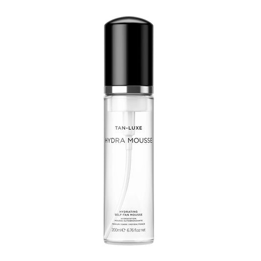 TAN-LUXE Hydra Mousse bottle and foam demonstrating a clean, transfer-free self-tan