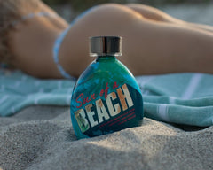 Tanning Paradise Sun of a Beach tattoo protection preserves tattoo vibrancy.