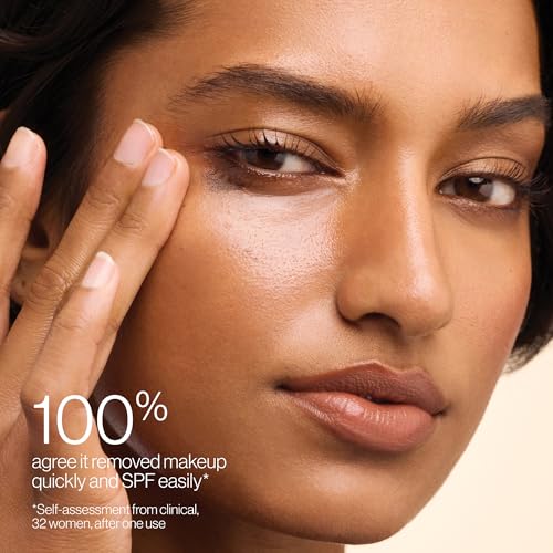 Tata Harper Nourishing Oil Cleanser applied on the face for soft cleansing.