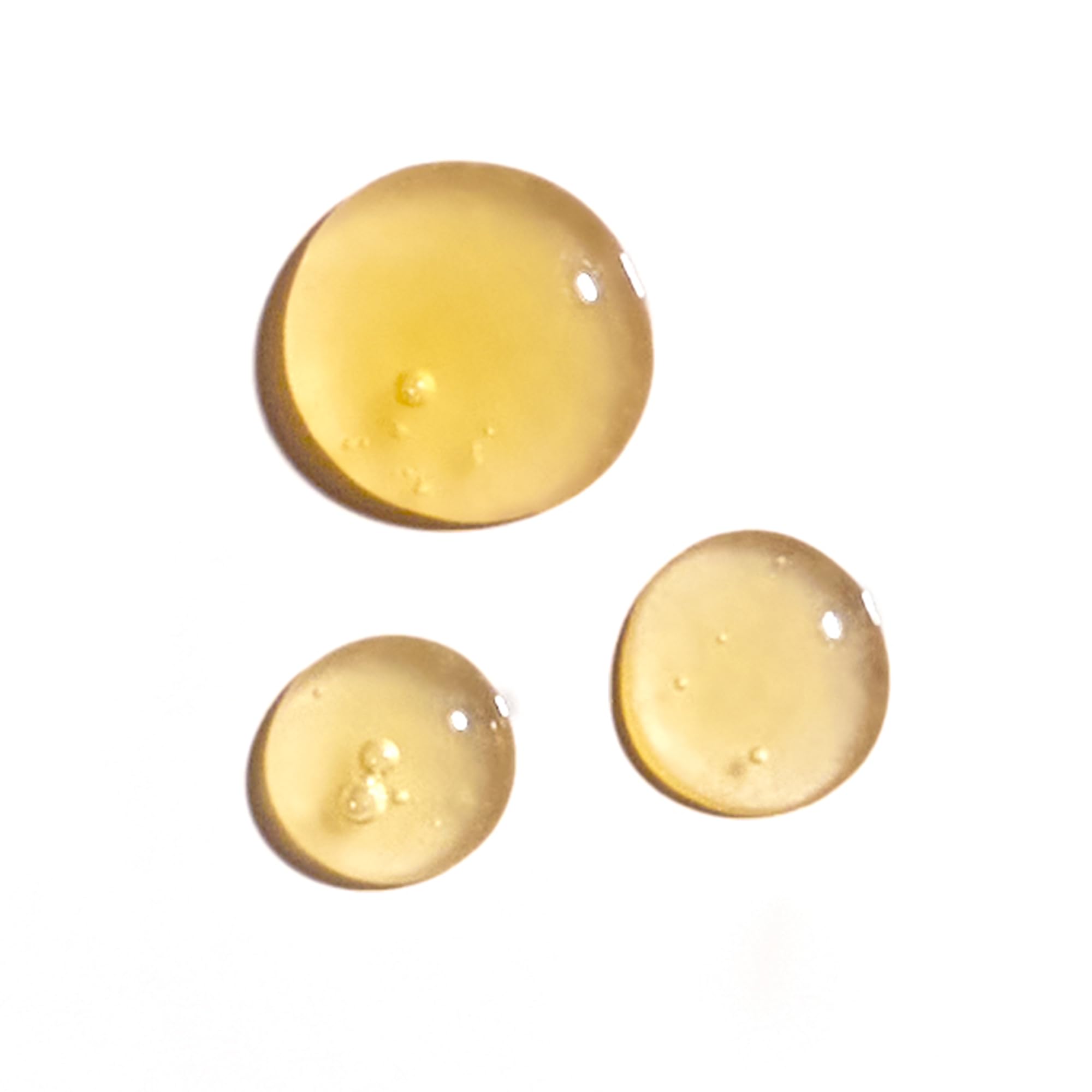 Tata Harper Nourishing Oil Cleanser bottle dispense close-up highlights silky cleansing texture.