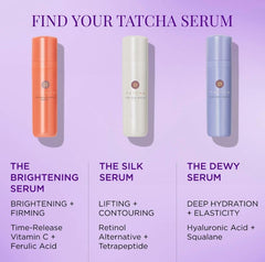 TATCHA Brightening Serum travel-size bottle beside towels.