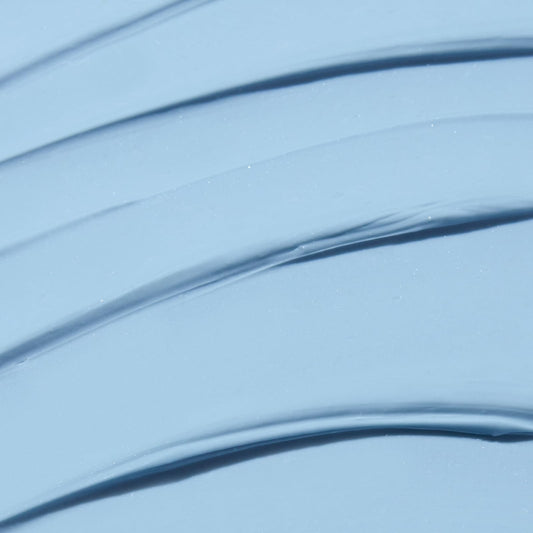 Close-up of Indigo Calming Cream texture showing creamy, soothing consistency.