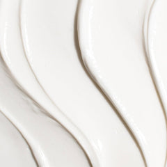 TATCHA Revitalizing Neck Cream on vanity for morning hydration ritual.