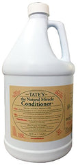Tate's The Natural Miracle conditioner on a bathroom shelf, ready for color-treated hair care