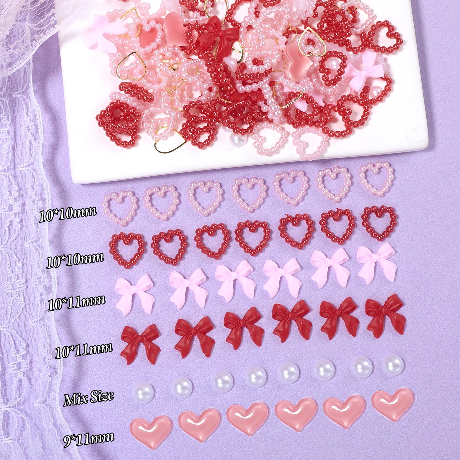 Tatiwoo pink-red heart charms create romantic focal points for nails.