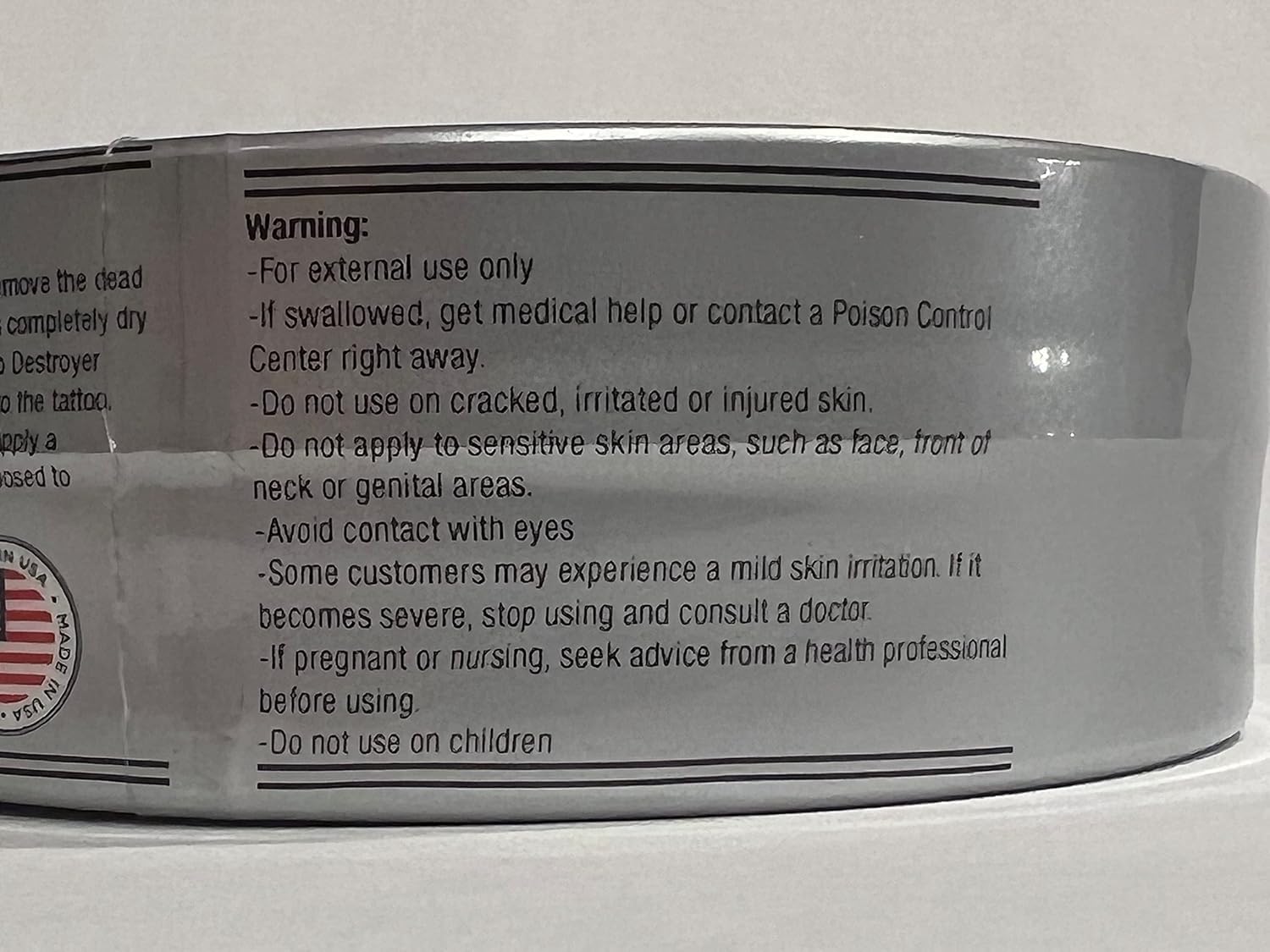 Close-up of Tattoo Destroyer ingredient list for skin-friendly formula.