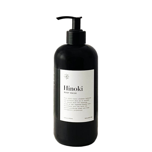 TE + TE Hinoki Body Wash bottle pour highlights a calming, Hinoki-infused cleanse.