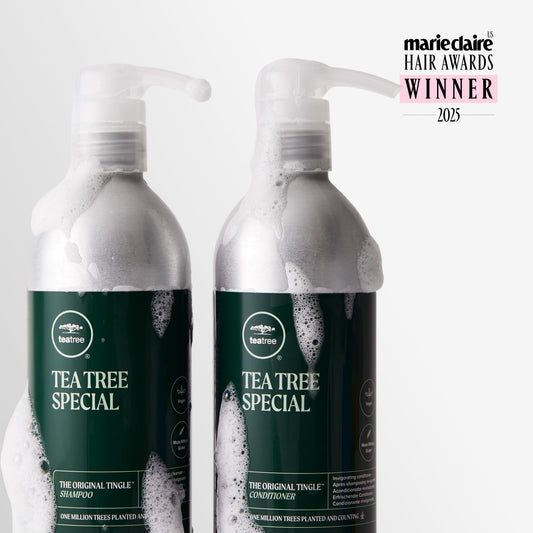 Tea Tree Special conditioner bottle applying to hair for detangling and smoothing.