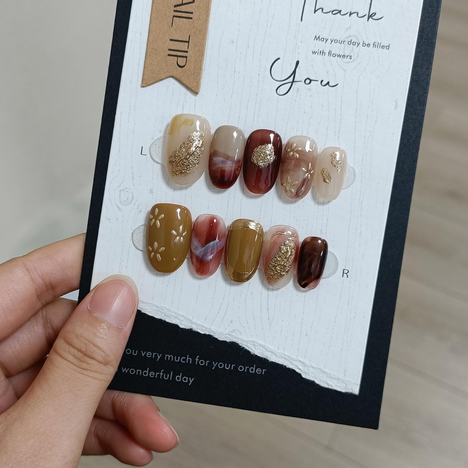 TENPAL Amber Cat Eye Nails for a glam evening look.
