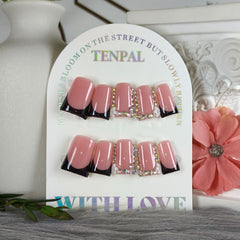 TENPAL pink-black French tip duckbill nails for chic at-home manicure.