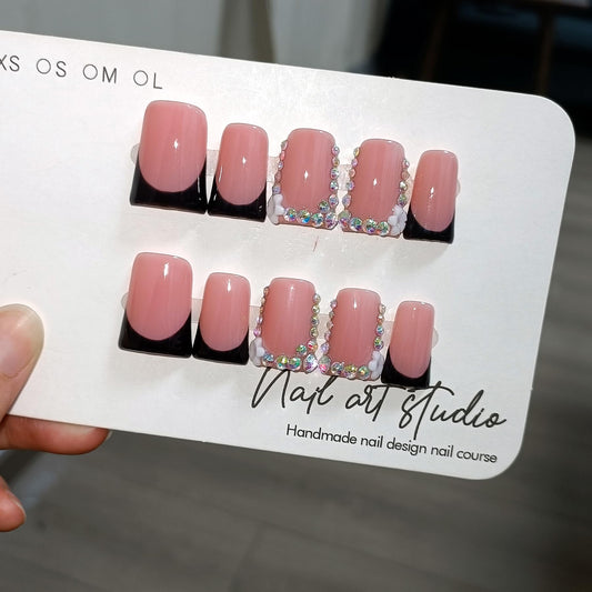 TENPAL nails with rhinestone edge provide sparkle for events.