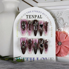 Gothic pink and black swirl TENPAL nails for bold fashion