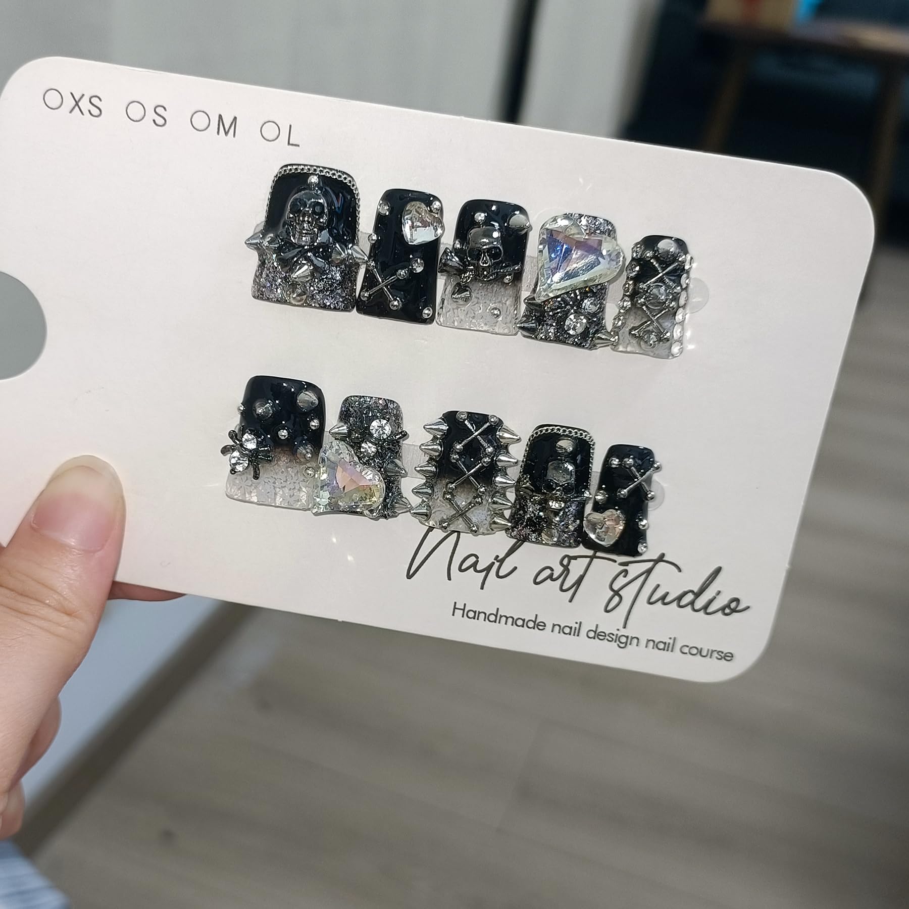 TENPAL Halloween party nails with skull accents for festive flair.