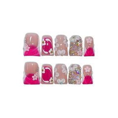 TENPAL iridescent florals and gold pearls on nails