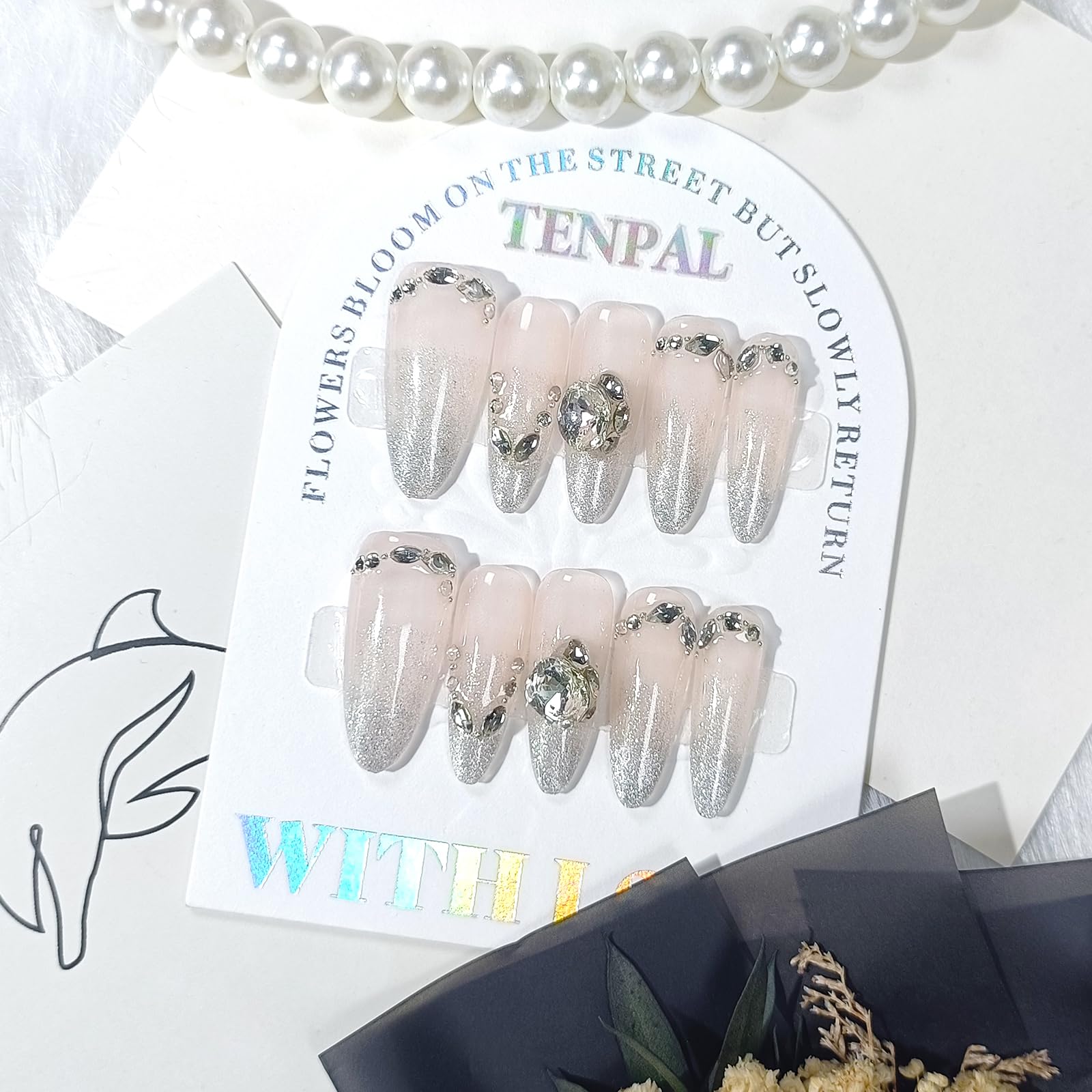TENPAL luxury diamond accents on nails sparkle under light.