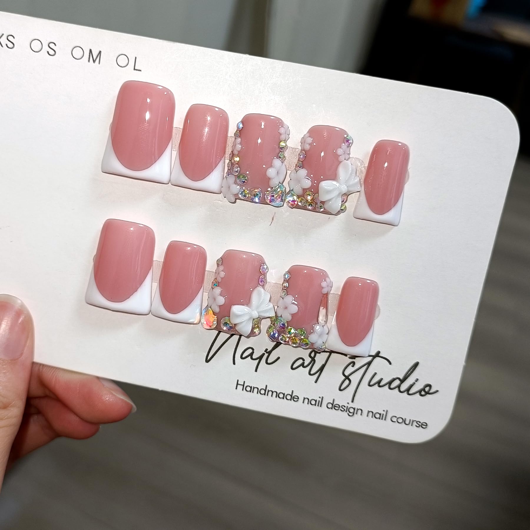 TENPAL nails with rhinestones and a 3D bow add sparkle for special occasions