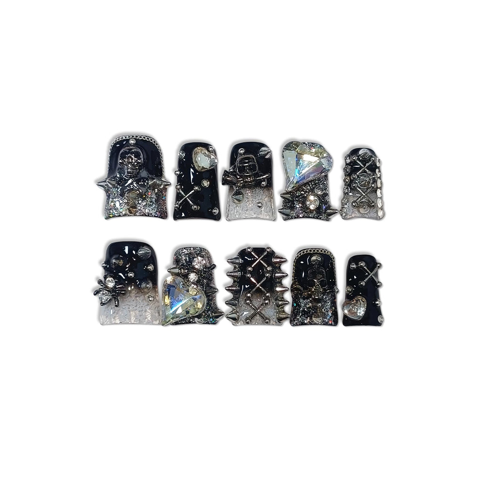 TENPAL Punk studs and crystal skull nails for bold Halloween-ready look.