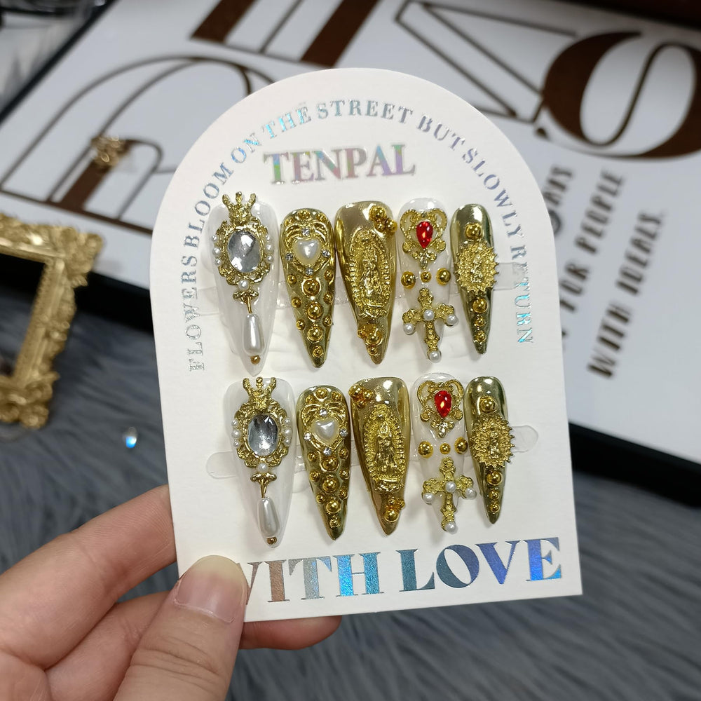 TENPAL royal press-on nails in gold stiletto with pearl charms for elegant events.