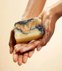 Terrabeautybars Marble Beauty Bar on hand, handmade by sisters, artisanal skincare ritual.