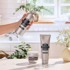 Applying Tesori d'Oriente body cream to skin for daily hydration.